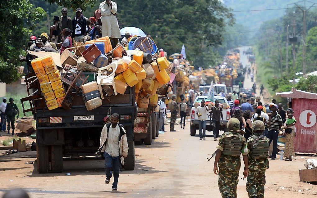 Moslims verlaten zondag Bangui uit vrees voor aanslagen door christenmilities. Foto AFP