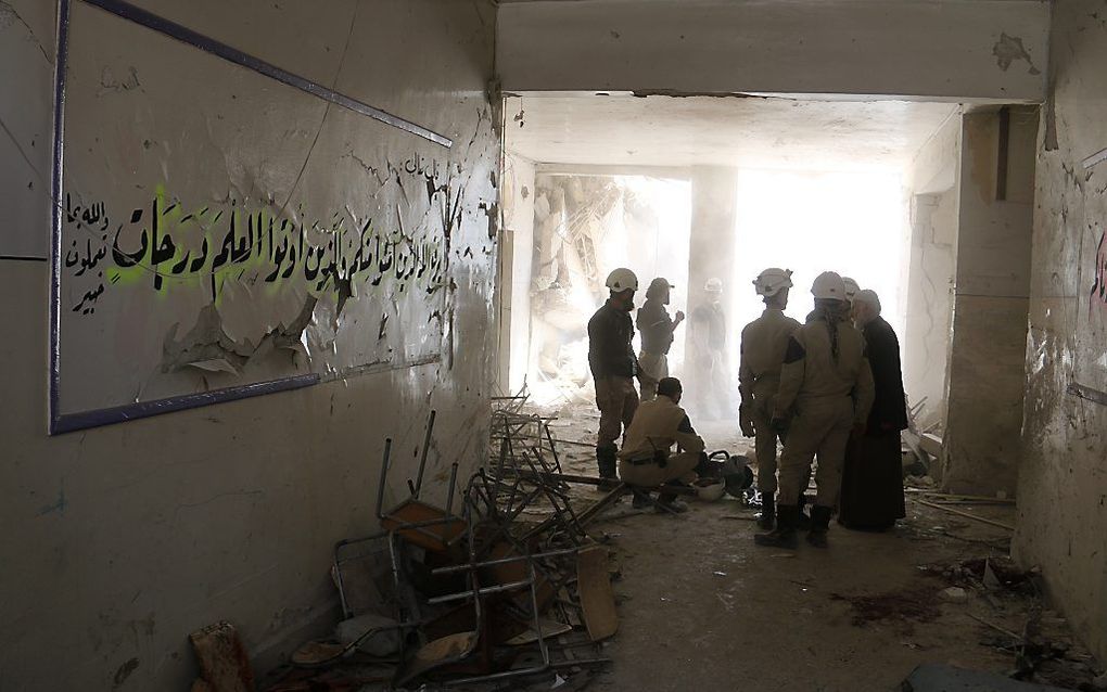 In Aleppo vielen woensdag al 18 doden toen het Syrische leger een school bombardeerde. De stad ligt vrijwel dagelijks onder vuur. Foto AFP