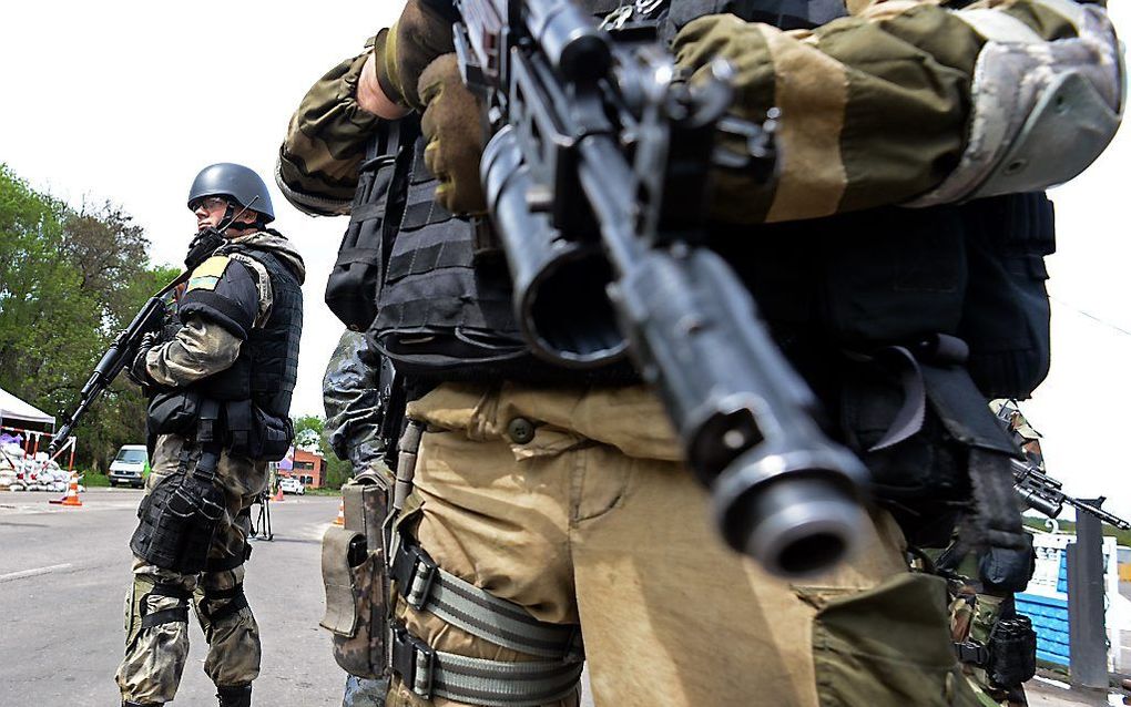 Oekraïense militairen bij de stand Slovjansk. Foto AFP