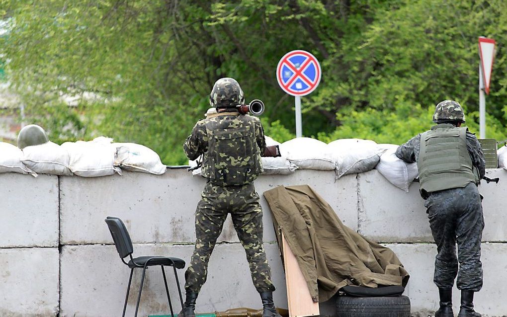 Oekraïense militairen bij Slovjansk. beeld AFP