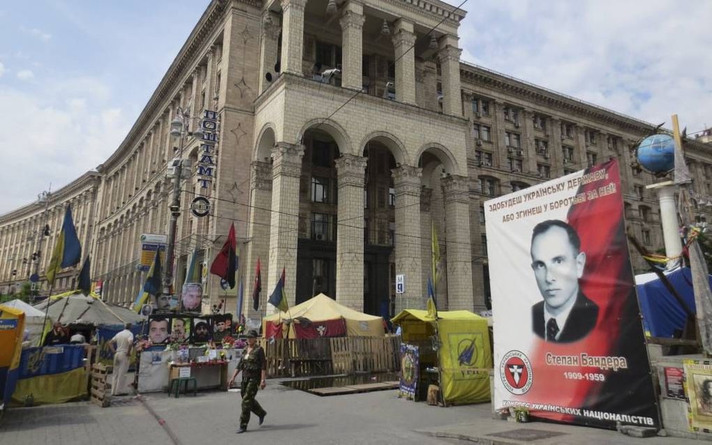 Op het Onafhankelijkheidsplein in Kiev staat het portret van de nationalistische leider Stepan Bandera. Bij rechts geliefd, door Russen verworpen als een collaborateur met Hitler. Foto Floris Akkerman