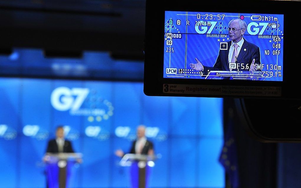 Herman van Rompuy op een tv-scherm. beeld AFP