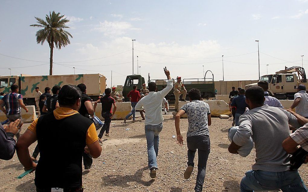 Vrijwilligers melden zich in Bagdad om te vechten. beeld AFP