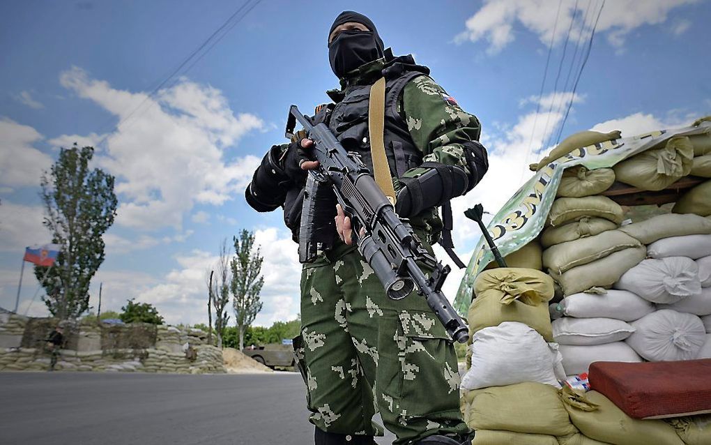 Pro-Russische militair in Donetsk. Foto EPA