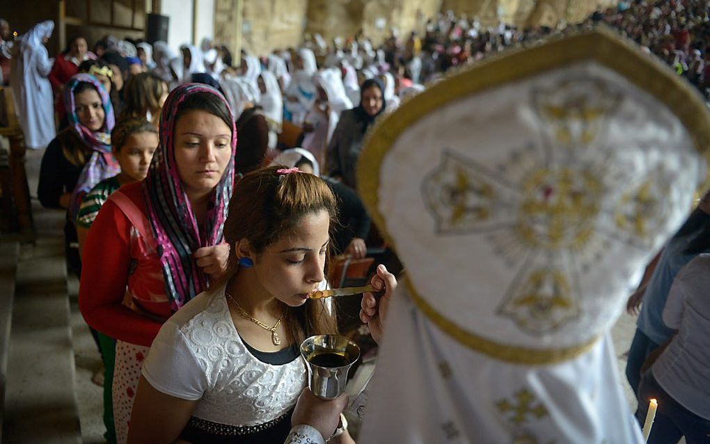 Kerkdienst in Cairo. Foto AFP