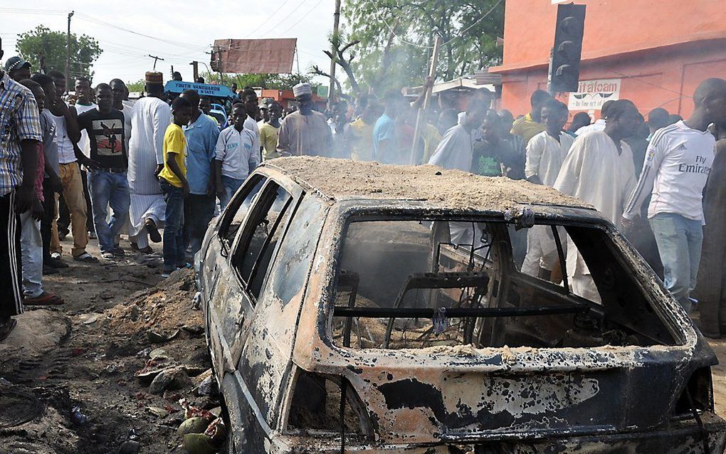 De auto waar de explosieven in verstopt waren. Foto AFP