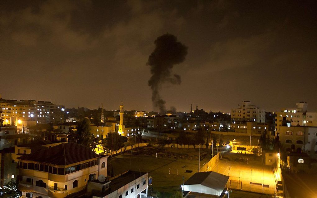 Rook boven Gaza-Stad na een raketinslag. Beeld AFP