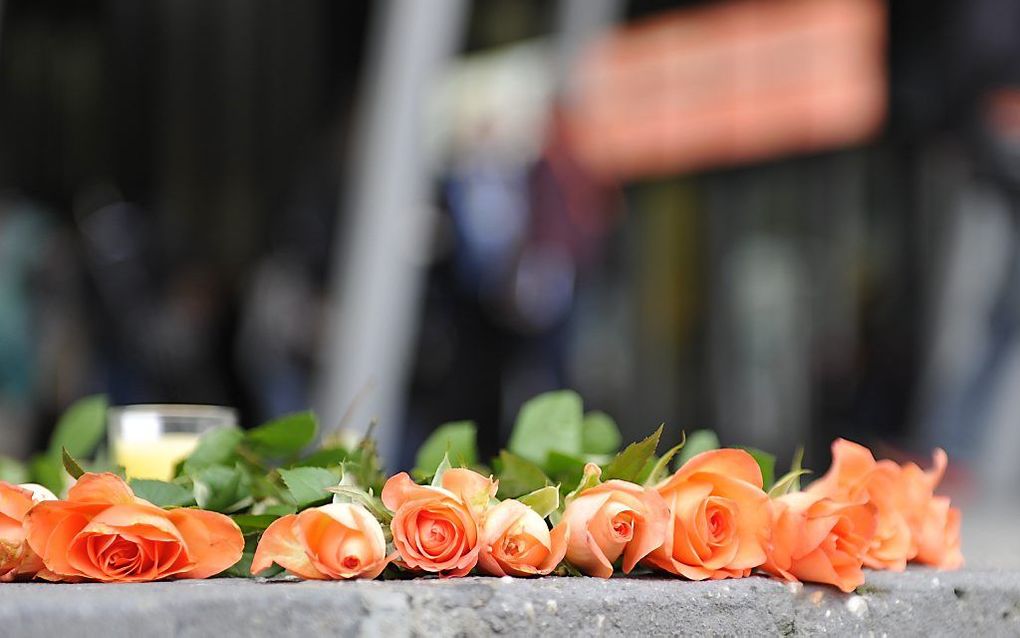 Bloemen voor het beurs- en conferentiecomplex MCEC in het Australische Melbourne, ter nagedachtenis aan de slachtoffers van de vliegramp in Oekraïne. Hier wordt een internationale aidsconferentie gehouden, waar ten minste zes wetenschappers naar onderweg 