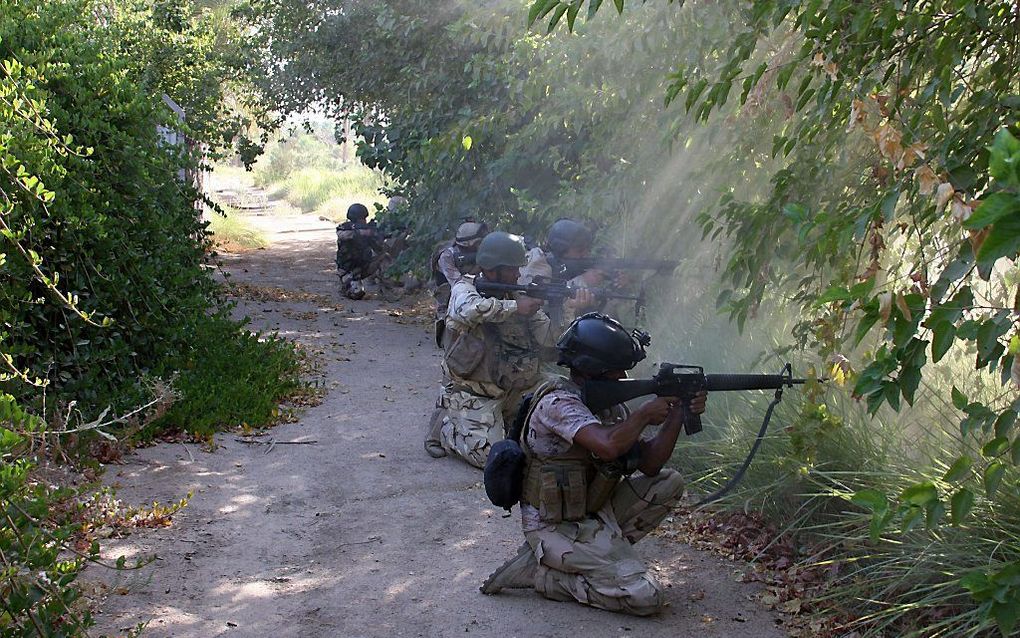 Iraakse militairen heroveren de christelijke plaats Jurf al-Sakhr, 45 kilometer van Bagdad, op de strijders van IS. beeld AFP