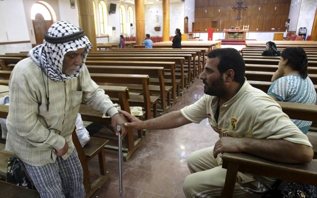 Gevluchte christenen in een kerk in Noord-Irak. beeld EPA