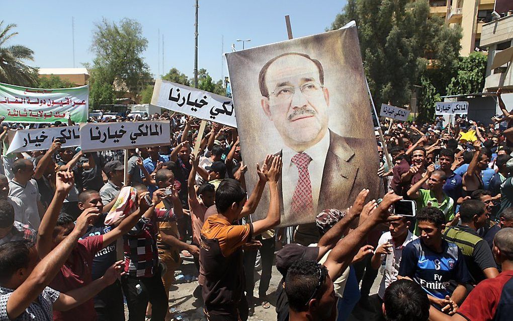 Aanhangers van Al-Maliki. Foto AFP