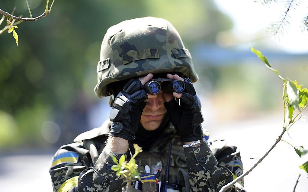 Een lid van een Oekraïens vrijwilligersbataljon. beeld AFP