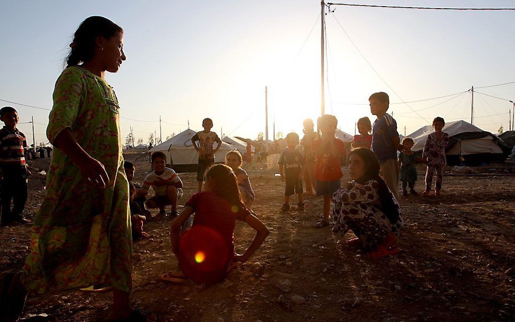 Irakese kinderen in een vluchtelingenkamp. Beeld AFP