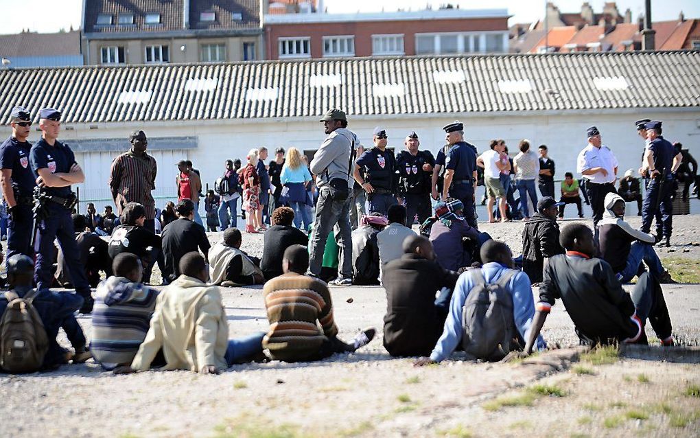 Immigranten in Calais. beeld AFP