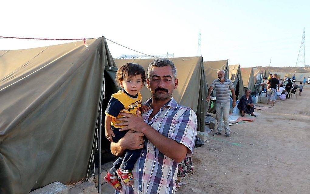 Christenen in een vluchtelingenkamp in het noorden van Irak. Beeld EPA