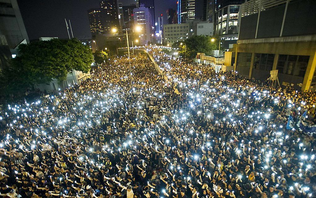 De demonstranten in Hongkong stellen de regering een ultimatum: als bestuurder Leung Chun-ying niet voor woensdag aftreedt en er geen goed plan komt om de democratie te herstellen, worden de protesten uitgebreid. beeld AFP