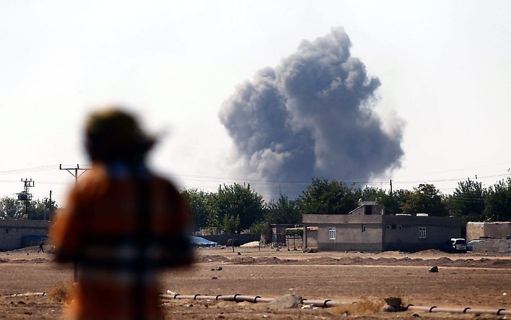 Rook boven de Syrische grensstad Kobani na een aanval van de coalitie tegen Islamitische Staat. beeld ANP