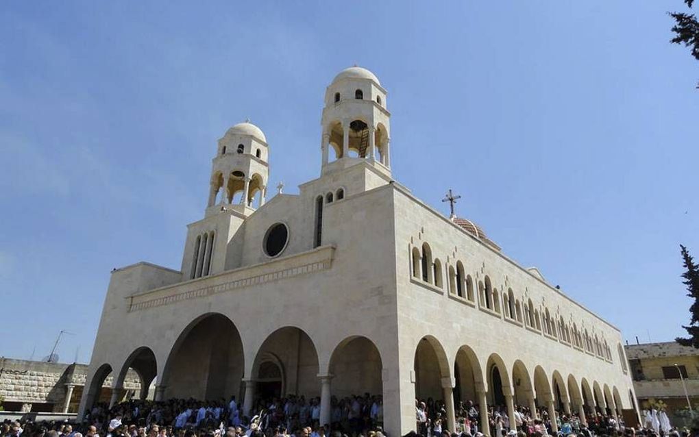 MHARDEH. Kerk in de Syrische stad Mhardeh, waar veel christenen wonen. De stad wordt belegerd door islamistische milities. beeld Fahed Al Wahil