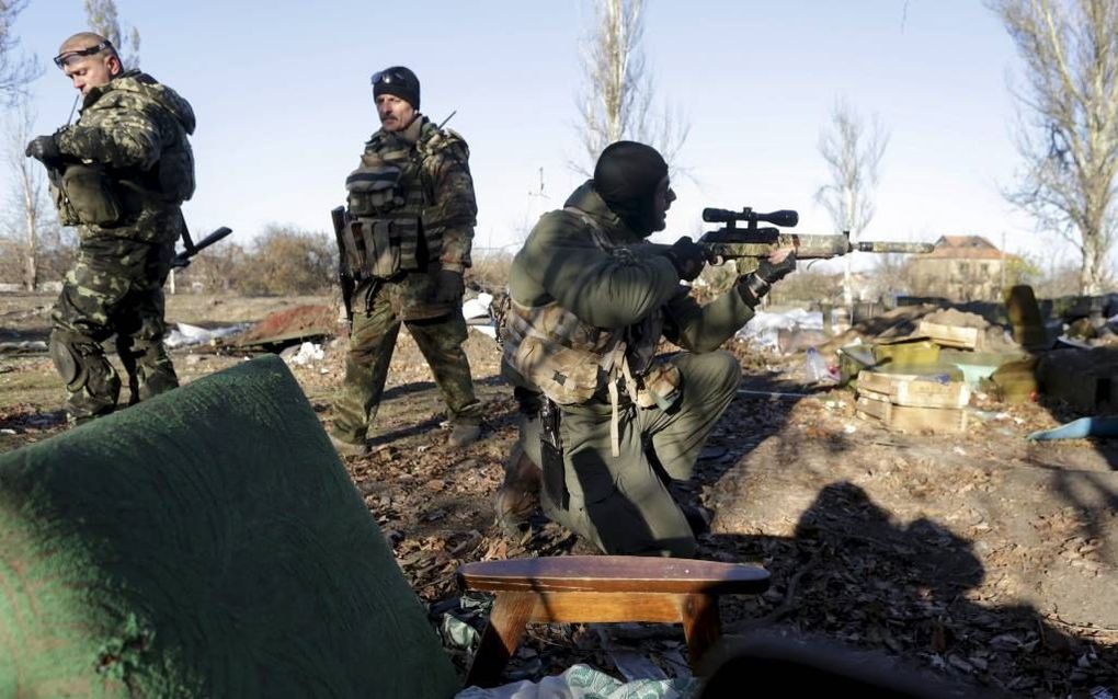 DONETSK. Hoewel prowesterse partijen de verkiezingen in Oekraïne hebben gewonnen, heeft het land nog een lange weg te gaan richting stabiliteit. De corruptie voert hoogtij en het oosten van Oekraïne kampt nog steeds met een oorlog. beeld EPA