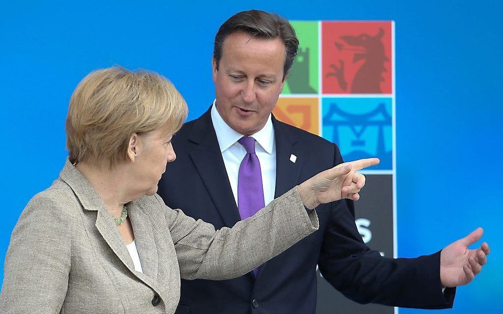 Merkel (l.) en Cameron. Beeld EPA