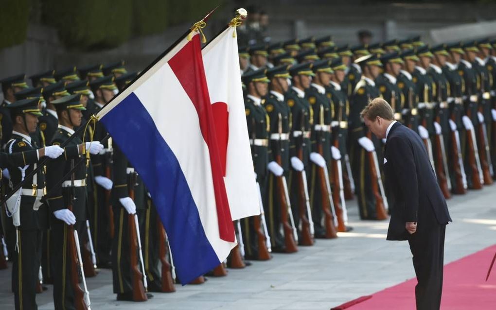 Ceremonieel ontvangst bij de vlag.   beeld EPA