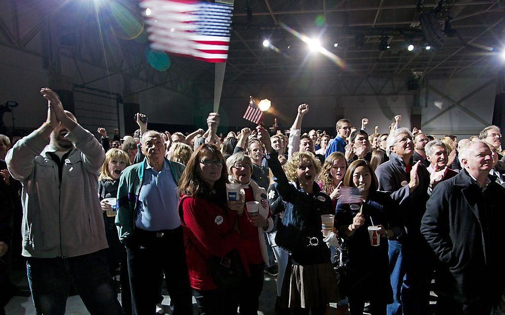 Amerikanen wachten in Wisconsin op de uitslagen. Beeld AFP