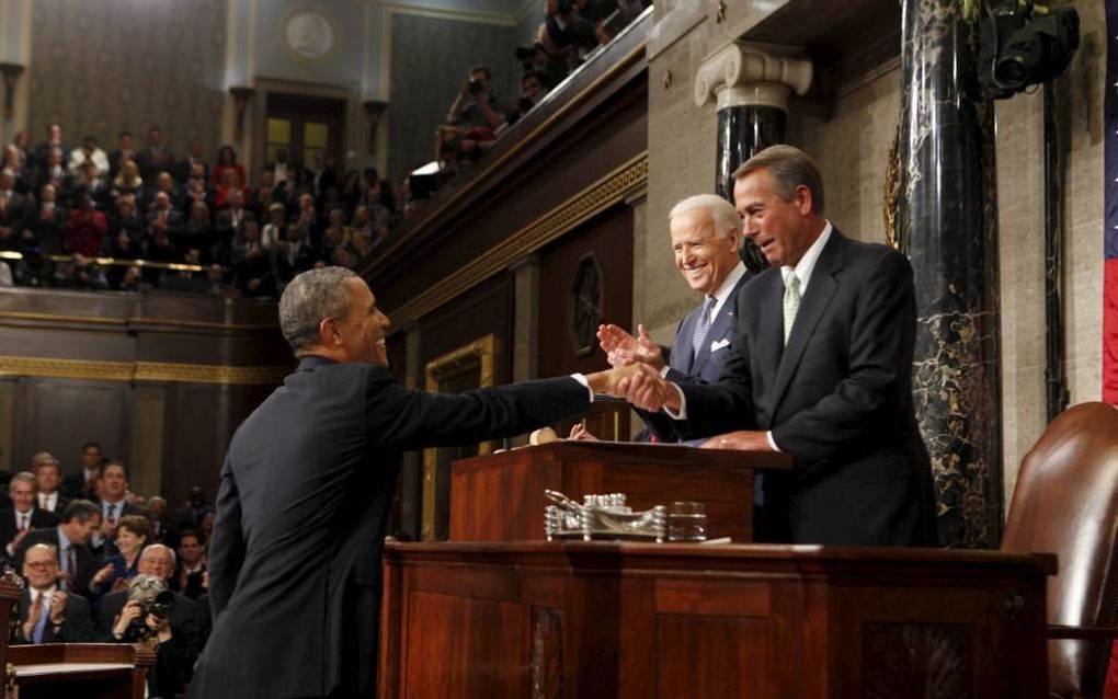 WASHINGTON. Obama schudt de hand van de Republikeinse leider Boehner. De politieke wil om CIA-agenten te vervolgen ontbreekt in de VS. beeld EPA