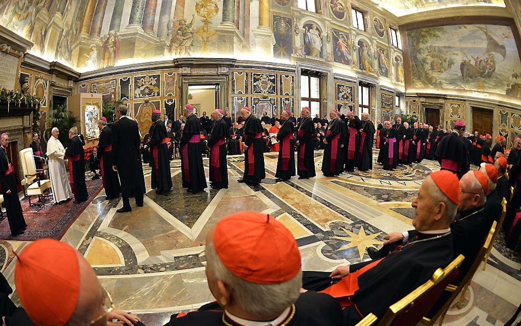 Franciscus en de Curie. beeld AFP