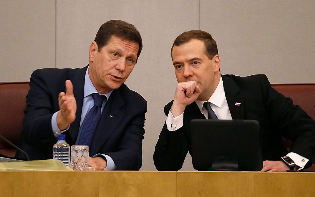 Dmitri Kozak (l.) naast de Russische premier Dimitri Medvedev. beeld EPA