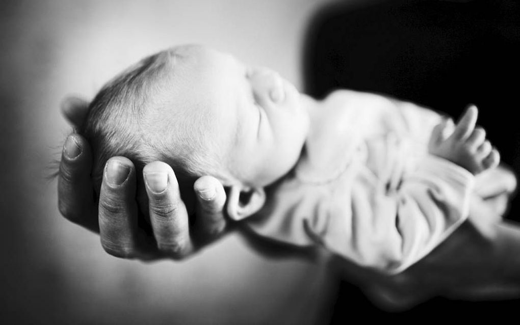 „Als iets katholiek is, dan wel het dopen van kinderen. Pas in de 16e eeuw kwam er verzet door dopersen en wederdopers.” beeld Istock