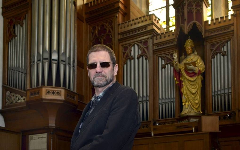 Paul Houdijk komt woorden te kort om aan te geven waarom hij zo lyrisch is over ‘zijn’ orgel in de Utrechtse Sint-Catharinakathedraal. „Het klinkt niet luid, maar wel vol, rond en zangerig.”  Beeld Ton Borsboom