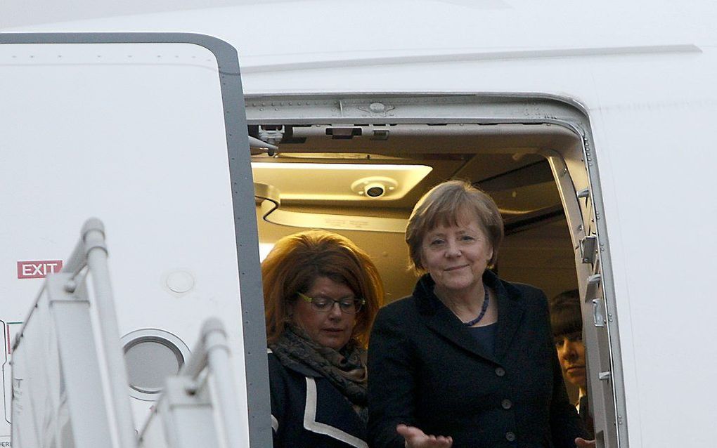 Bondskanselier Merkel arriveert in Minsk voor het topoverleg. beeld AFP