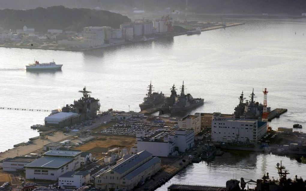 De marine-haven bij de Japanse stad Sasebo biedt niet alleen oorlogsschepen van Japan, maar ook die van de VS een thuishaven.  beeld EPA