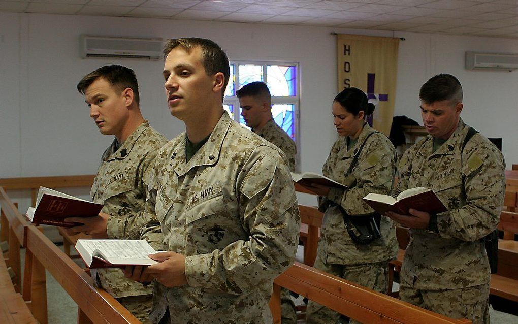 Amerikaanse militairen tijdens een kerkdienst op Al Asad Air Base in Irak, 2009. beeld US Marine Corps