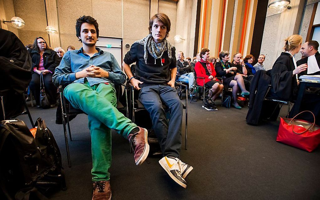 Studenten in de rechtszaal voor het kortgeding van de Universiteit van Amsterdam (UvA) over de bezetting van het Bungehuis. Beeld ANP