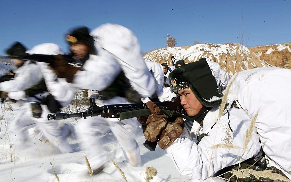 Chinese militairen op oefening. Beeld AFP