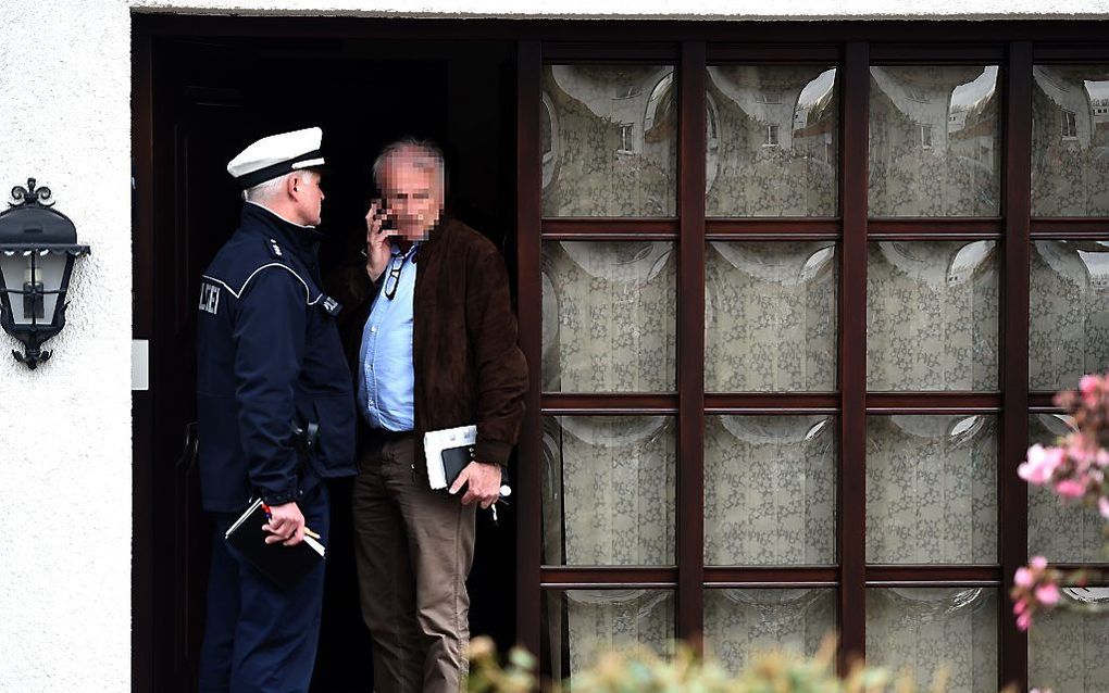 De politie doet onderzoek bij een huis in Montabaur. Beeld AFP