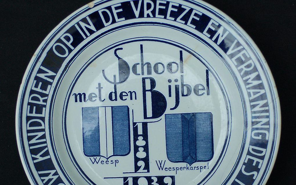 Docenten dubben soms over hun verhouding tot de identiteit van de school. beeld Nationaal Onderwijsmuseum