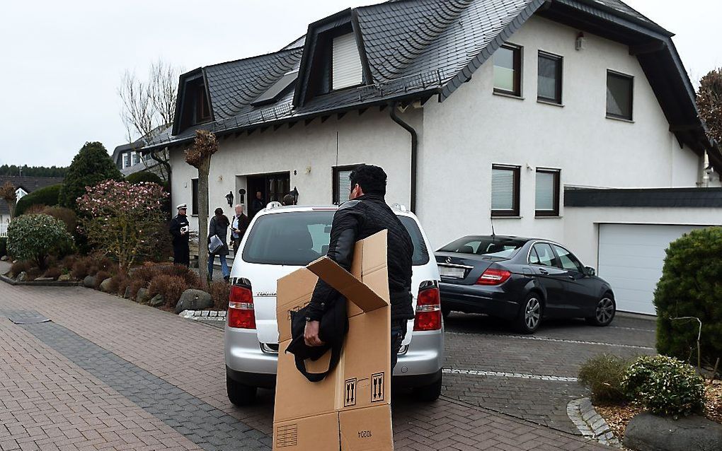 Onderzoek bij het huis van de copiloot. Beeld AFP