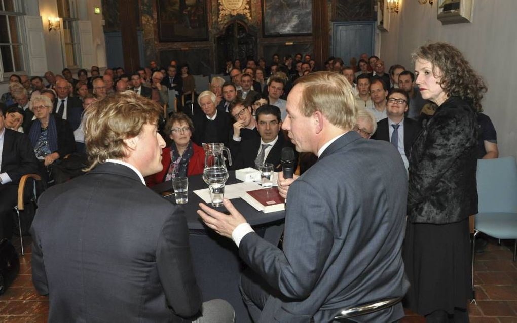 VVD-Kamerlid Taverne (links) en zijn SGP-collega Van der Staaij debatteerden maandag over de scheiding tussen kerk en staat. beeld Jan Schippers