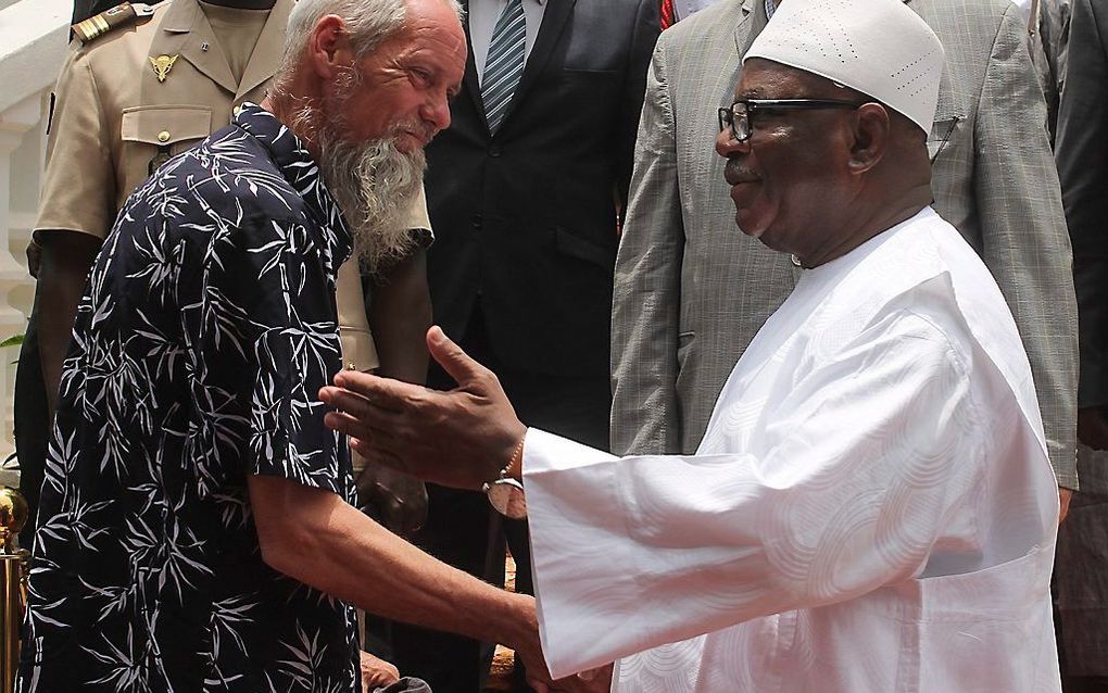 Sjaak Rijke en de president van Mali, Ibrahim Boubacar Keïta. beeld EPA