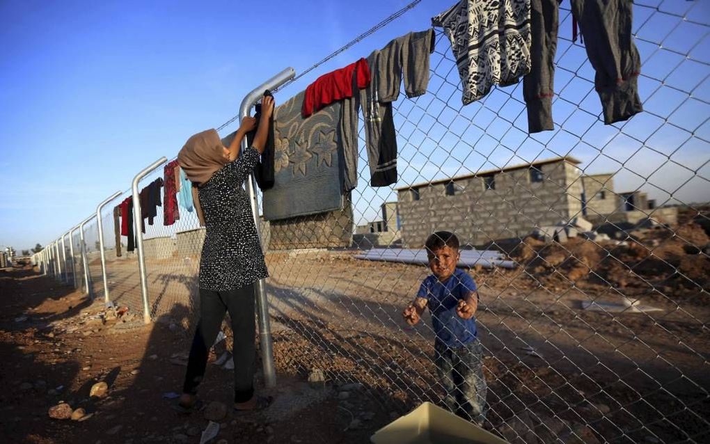 ERBIL. De gevechten rond de Noord-Iraakse stad Mosul hebben een enorme vluchtelingenstroom op gang gebracht. De ontheemden leven doorgaans onder erbarmelijke omstandigheden in vluchtelingenkampen. beeld AFP