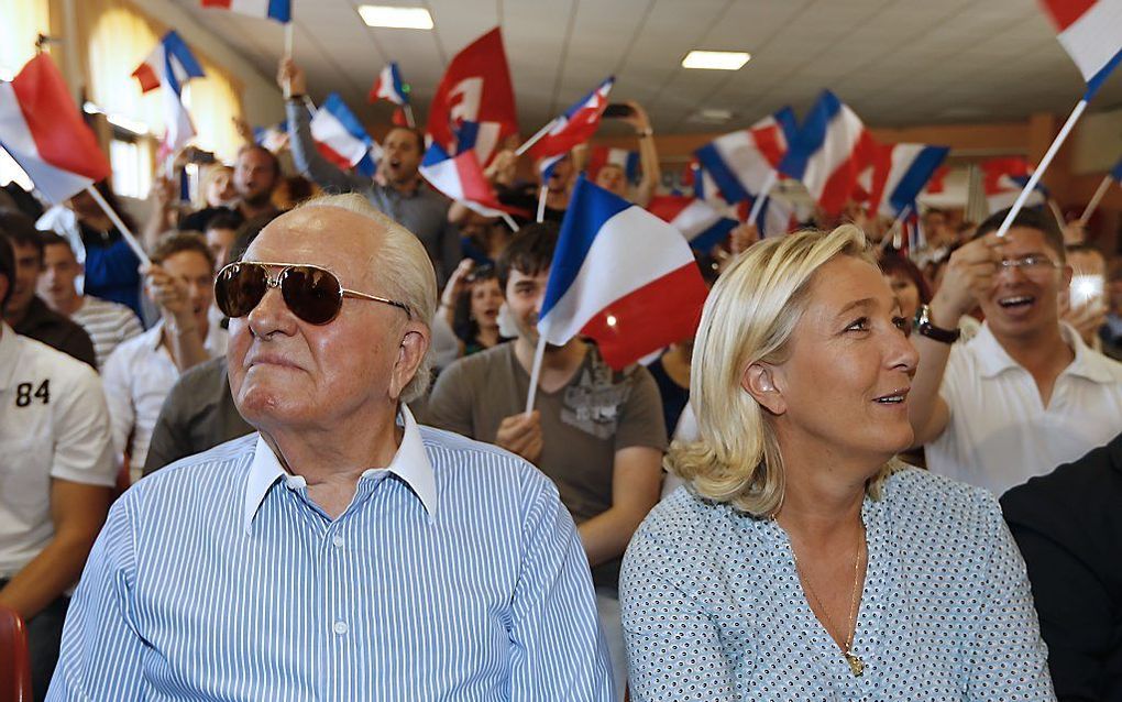 Jean-Marie en Marine Le Pen in september 2014. beeld AFP