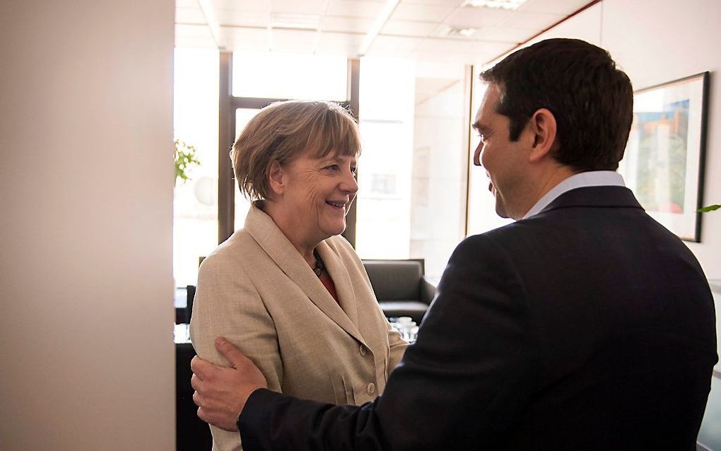 Angela Merkel en Alexis Tsipras. Beeld EPA