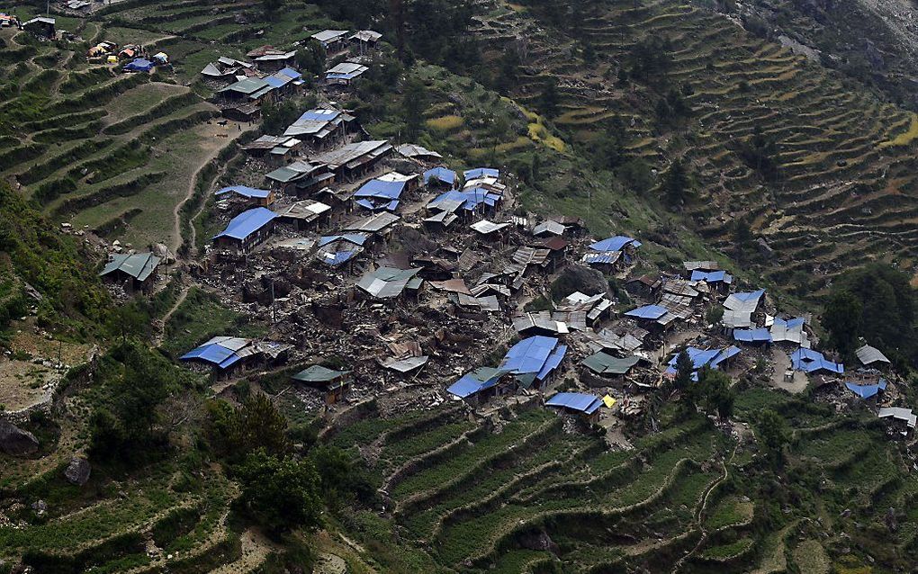 Getroffen bergdorpje in Nepal. Beeld AFP