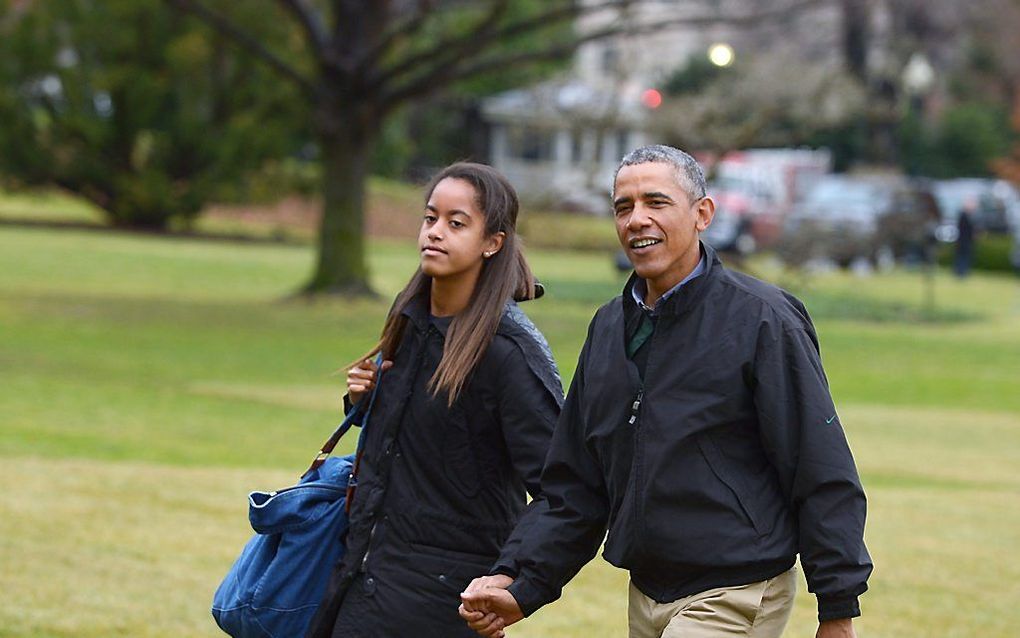 President Barack Obama met zijn dochter Malia. beeld AFP