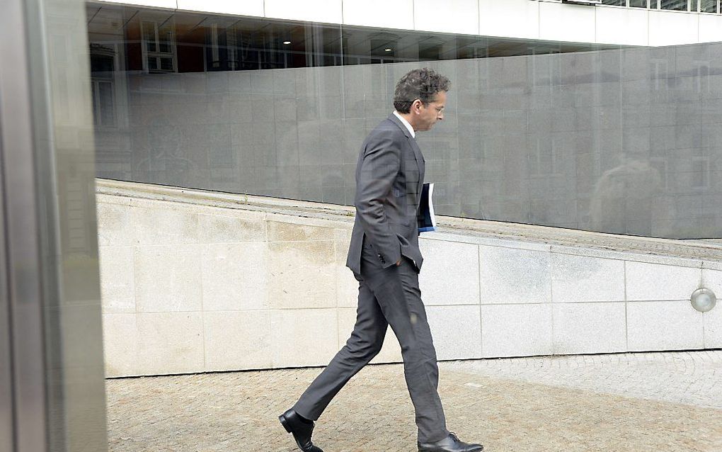 Dijsselbloem komt aan in Brussel. Beeld AFP