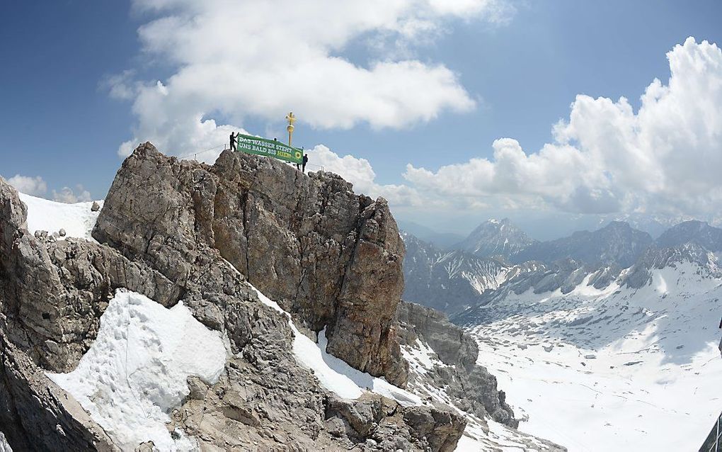 Activisten bij een eerder protest op de Zugspitze. Beeld AFP