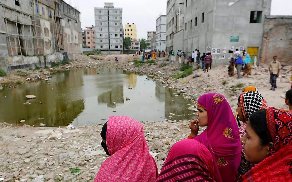 Het compensatiefonds voor de slachtoffers van de ramp in het textielcomplex Rana Plaza in Dhaka in Bangladesh is na meer dan twee jaar eindelijk gevuld. Dat maakte de Internationale Arbeidsorganisatie (ILO) maandag bekend. beeld AFP