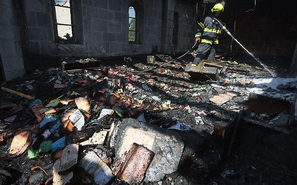 De uitgebrandde kerk in Tabgha. Beeld AFP